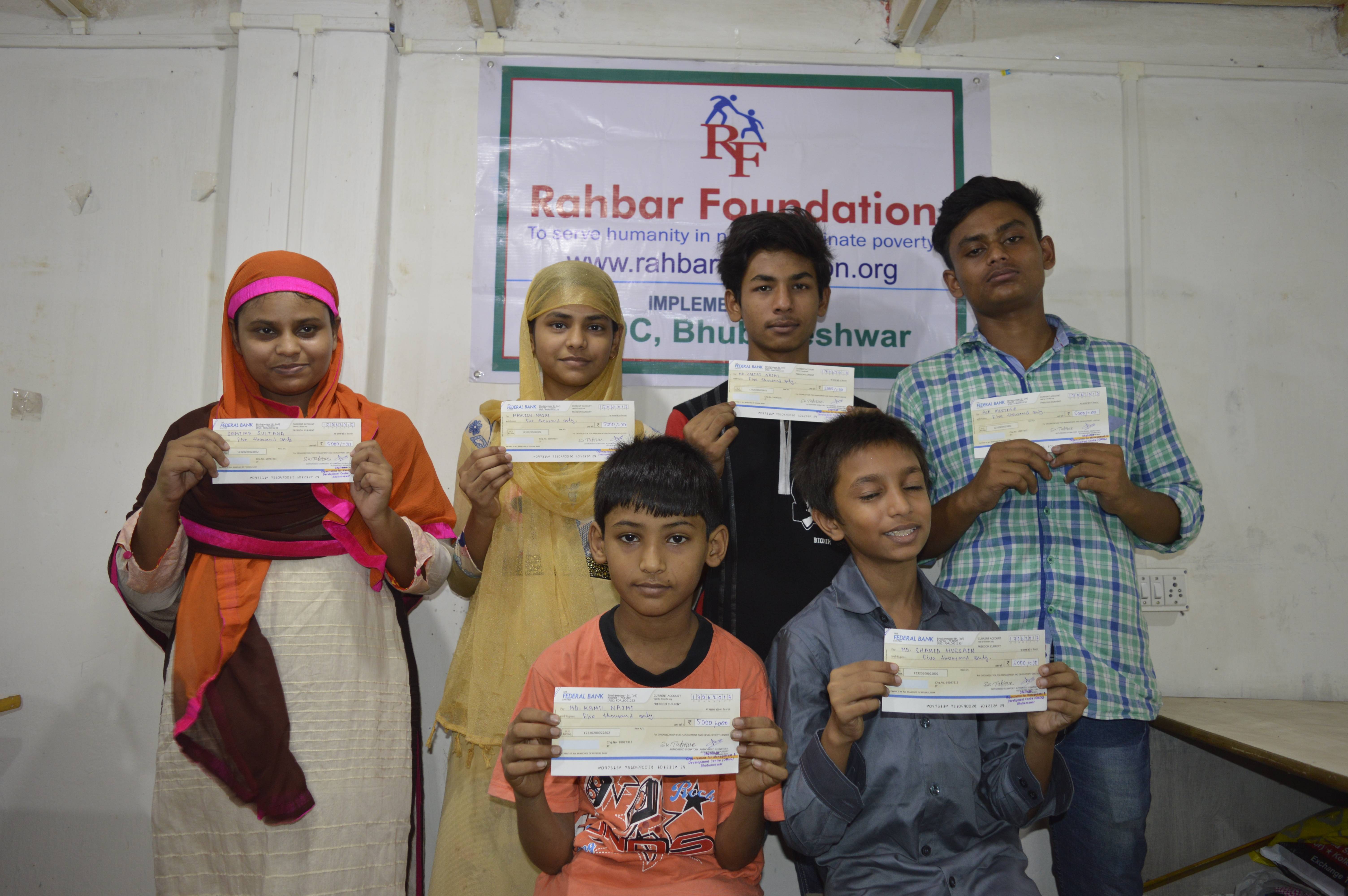 Scholarships distribution to orphan and poor students at Kolkata, West Bengal