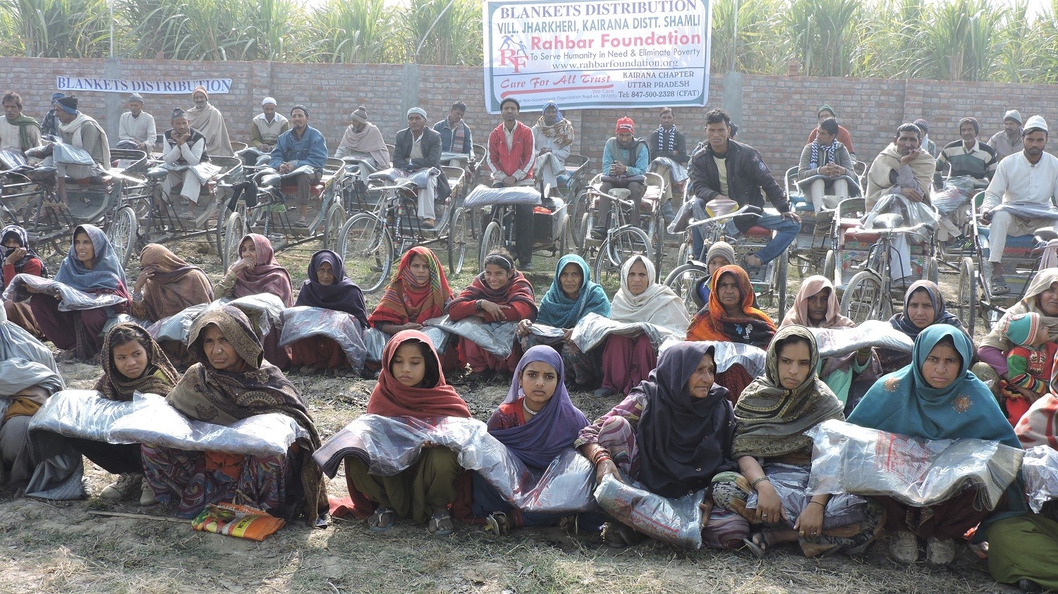 Blankets distribution to riot familes living in camps at Kairana, UP