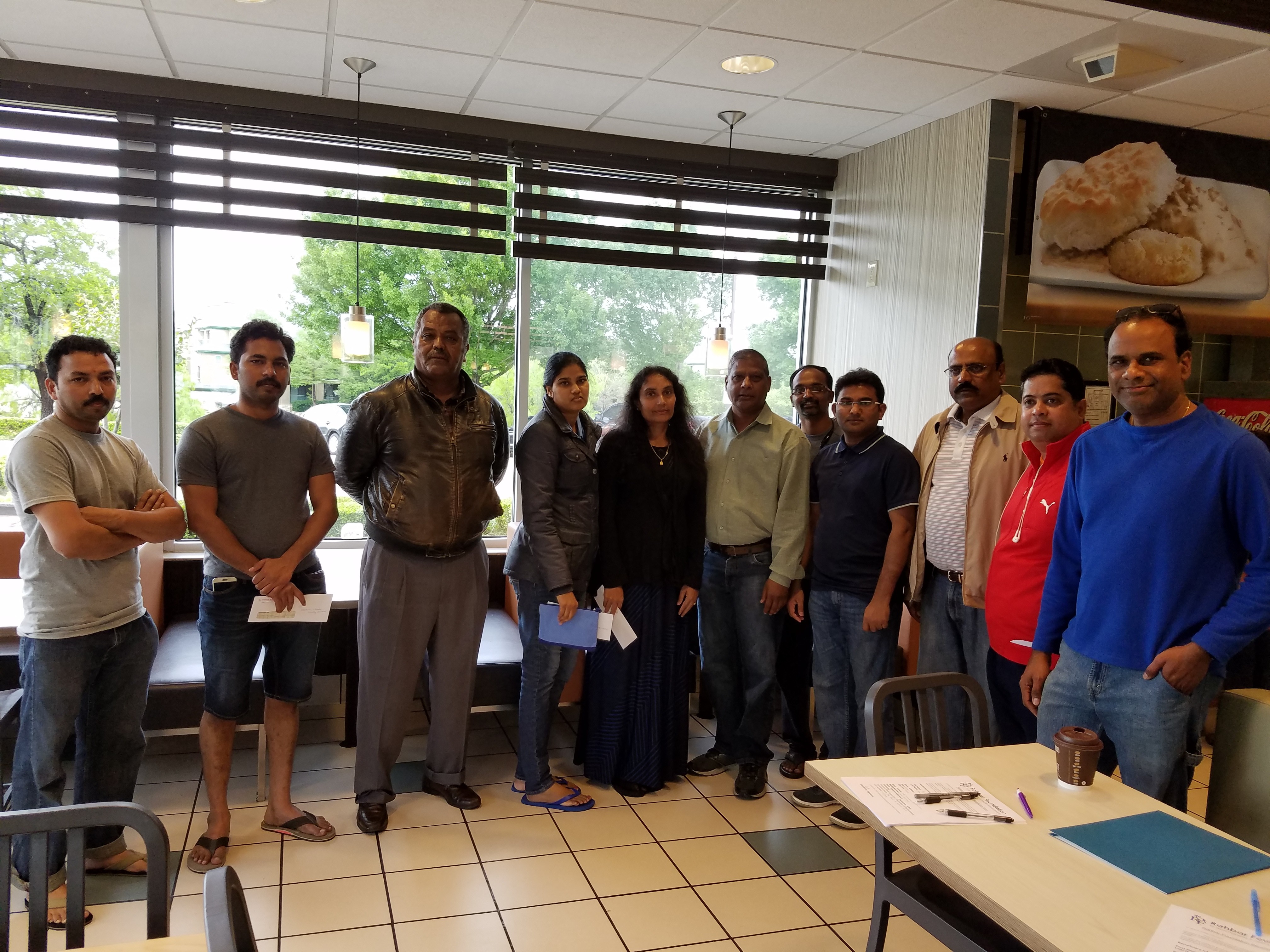 Financial support checks given to  Apts Fire Victims in Irving TX